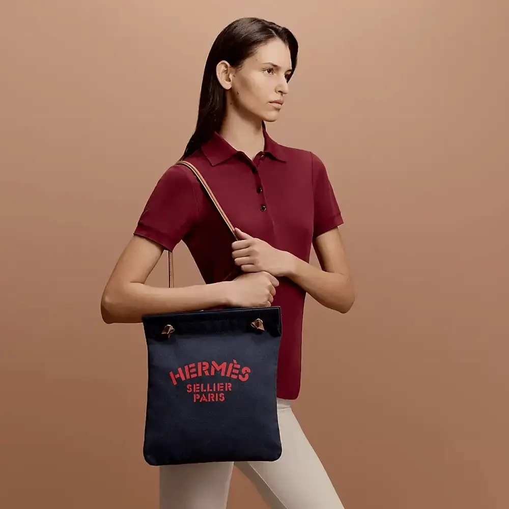 Hermes Aline grooming Bag in Swift calfskin bleu indigo gold Model shots 2