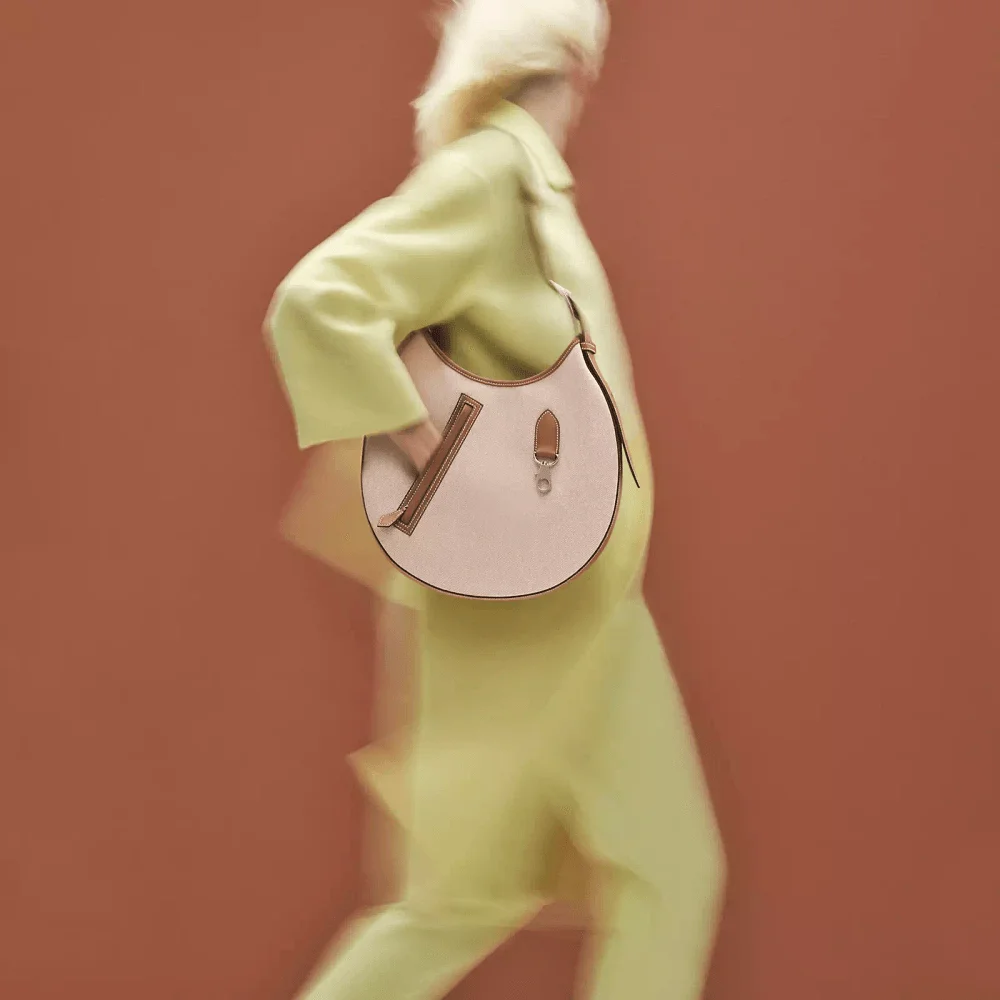 Hermes Arcon Bag in Togo Swift Ecru Beige Gold Model shots