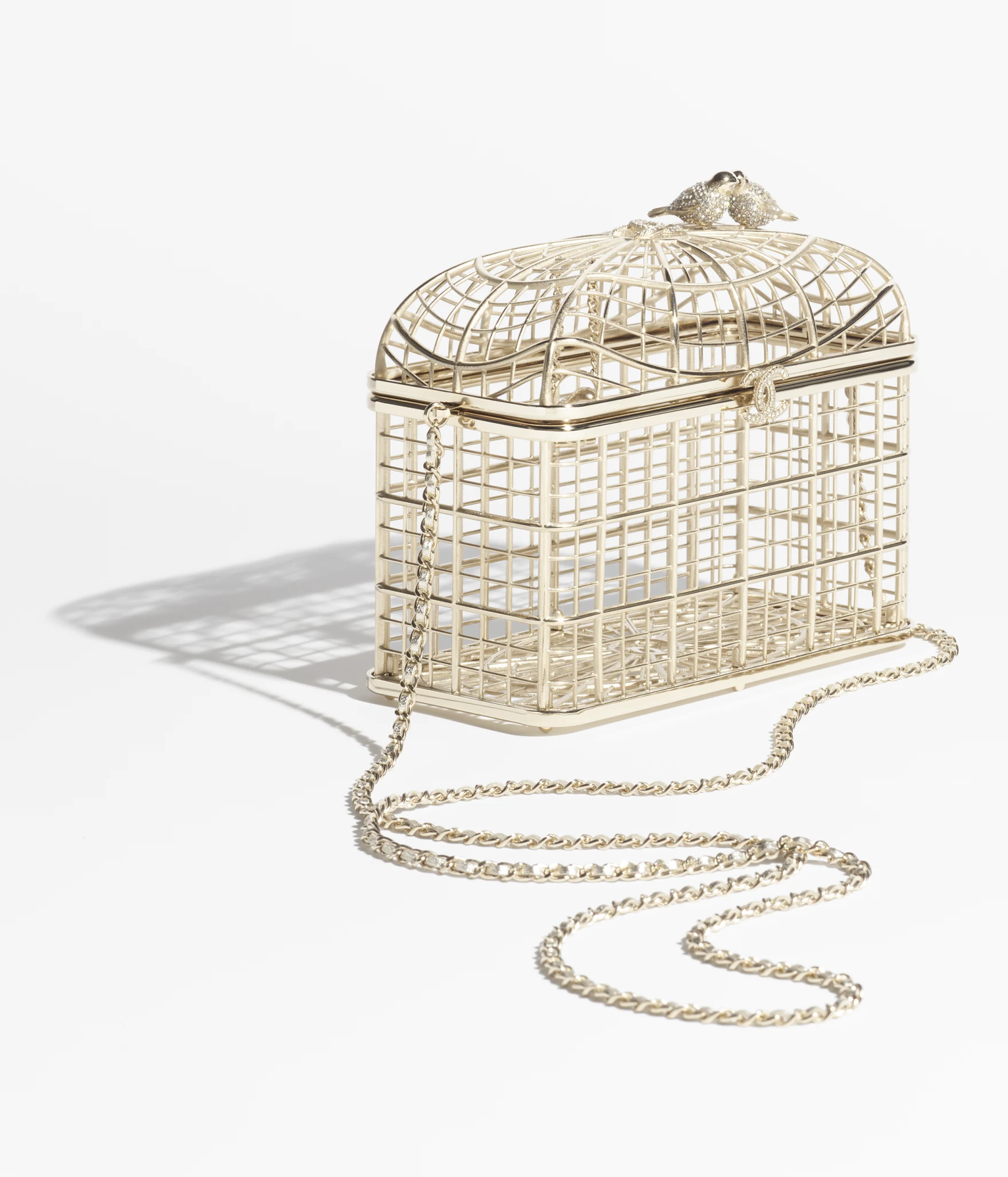 23. AS5495B20219U0203 chanel birdcage minaudiere gold tone metal strass