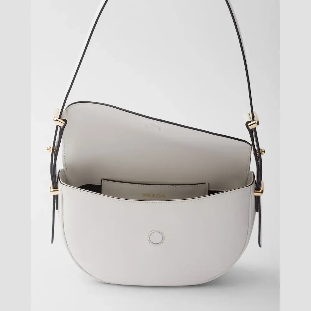 Prada Arqué leather shoulder bag with flap interior