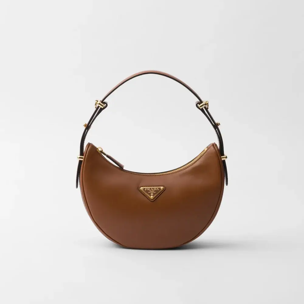 Prada Arqué small leather shoulder bag cognac