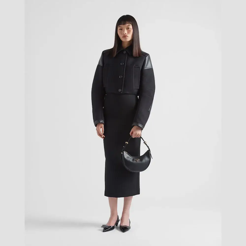 Prada Arqué small leather shoulder bag model hand carry